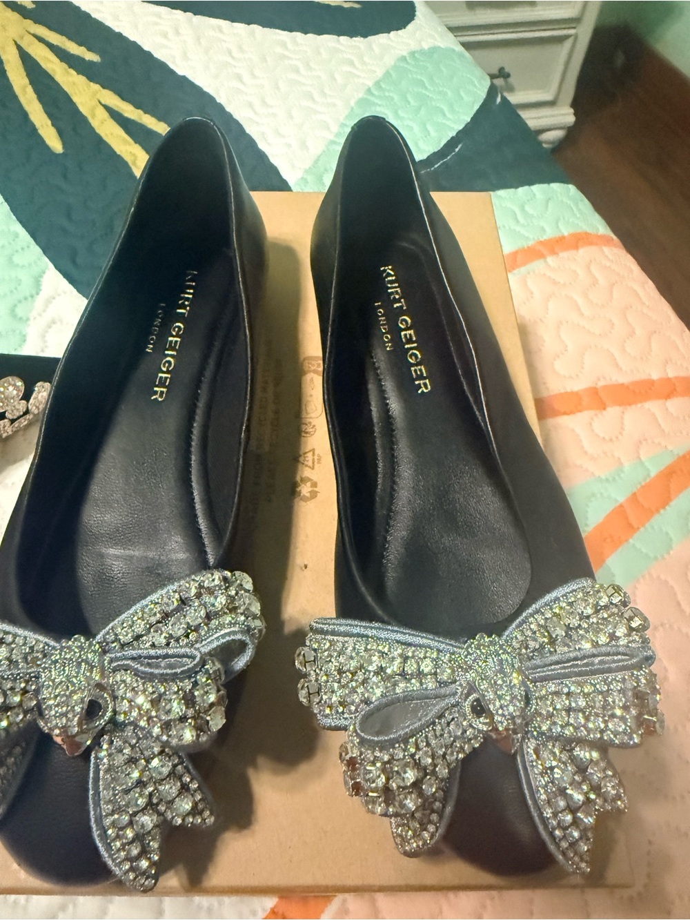 Kurt Geiger Black Flats with Crystal Bow Embellishment